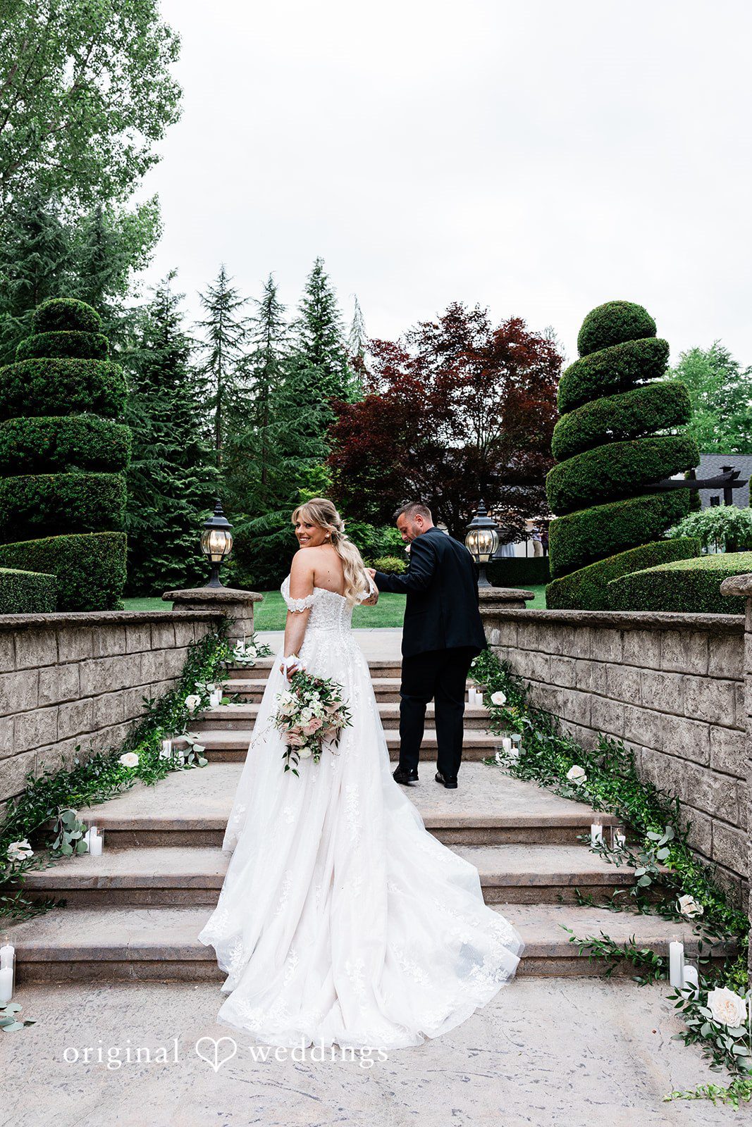AlyssaMay + Benjamin Beautiful picture of bride and groom at stairs of Rock Creek Gardens