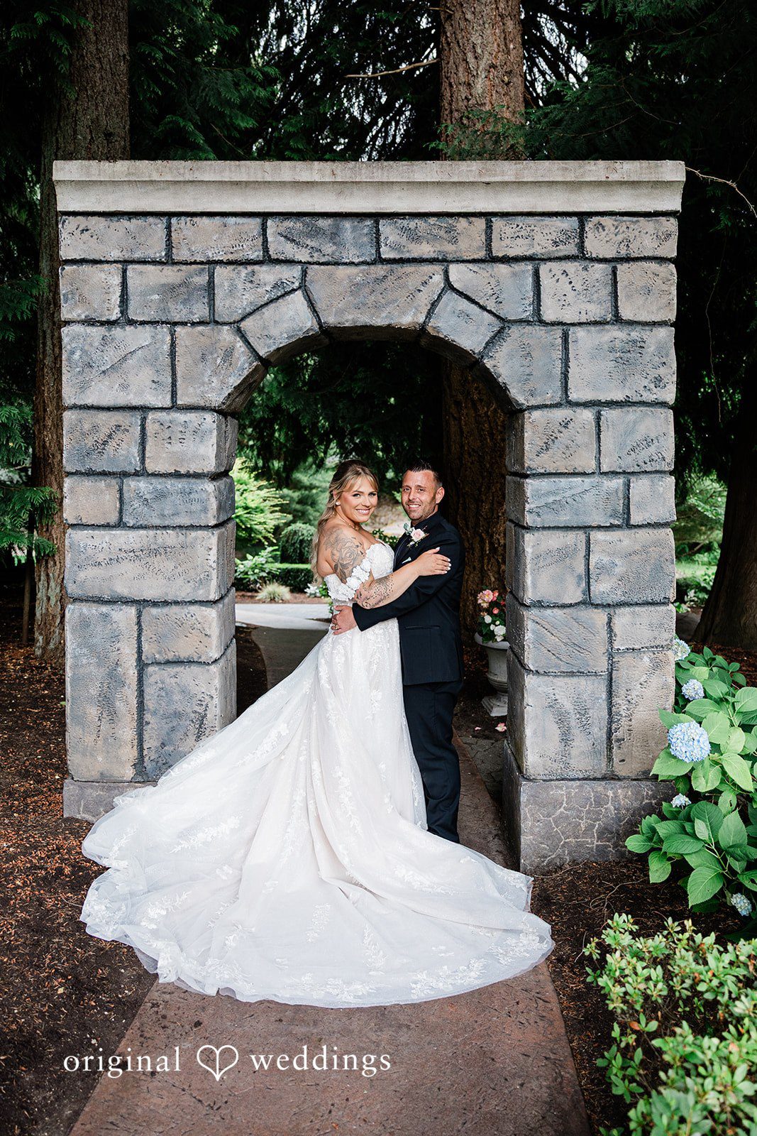 AlyssaMay + Benjamin Bride and groom posing for wedding photography at Rock Creek Gardens