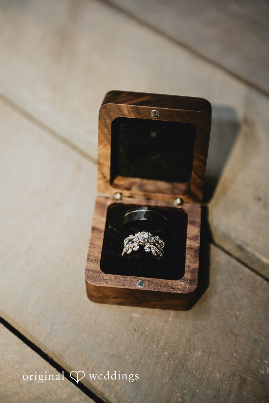 Julia + Kaleb Rocky's Lake Estate wedding rings detail photo