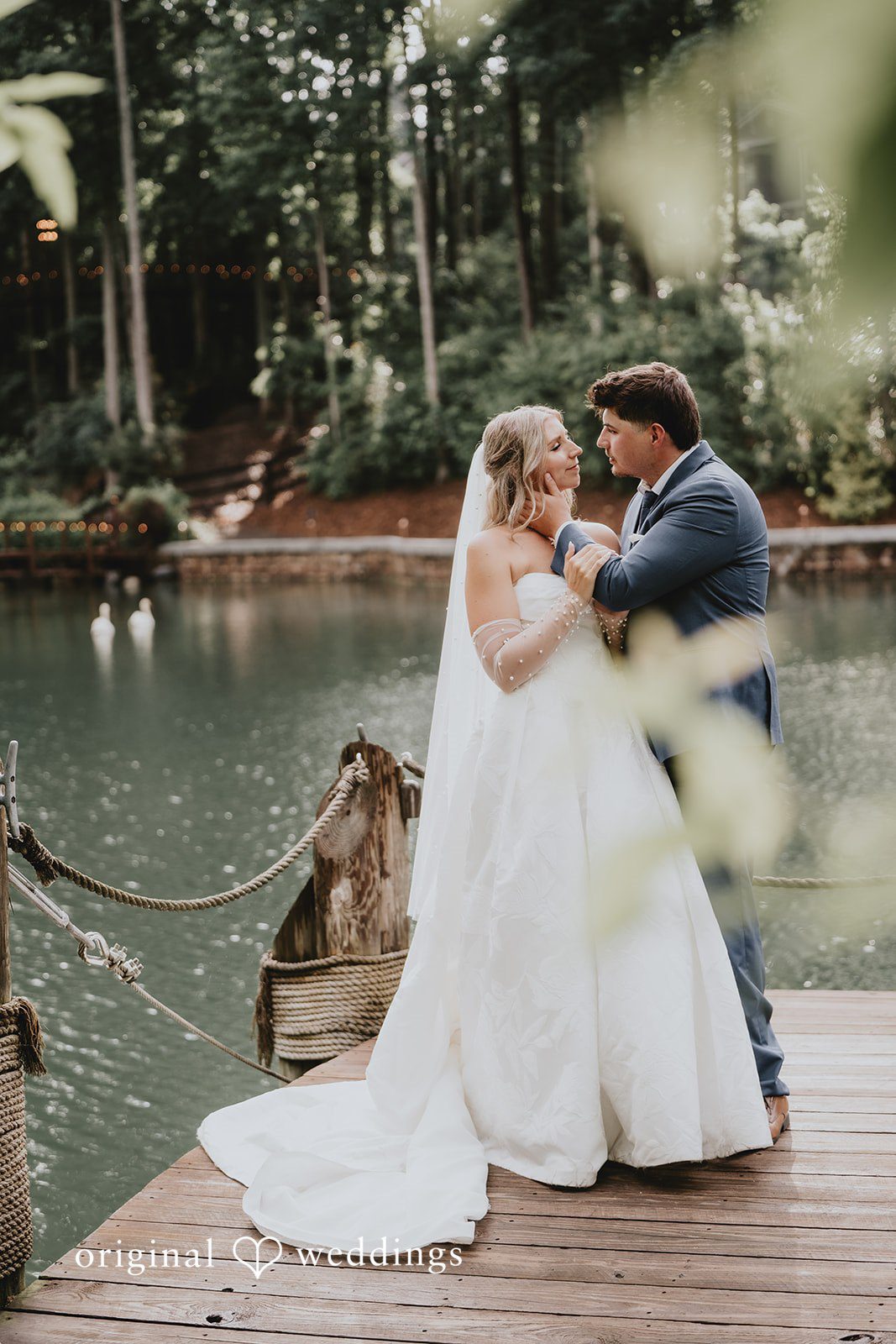 Julia + Kaleb Bride and groom full-length portraits by the dock