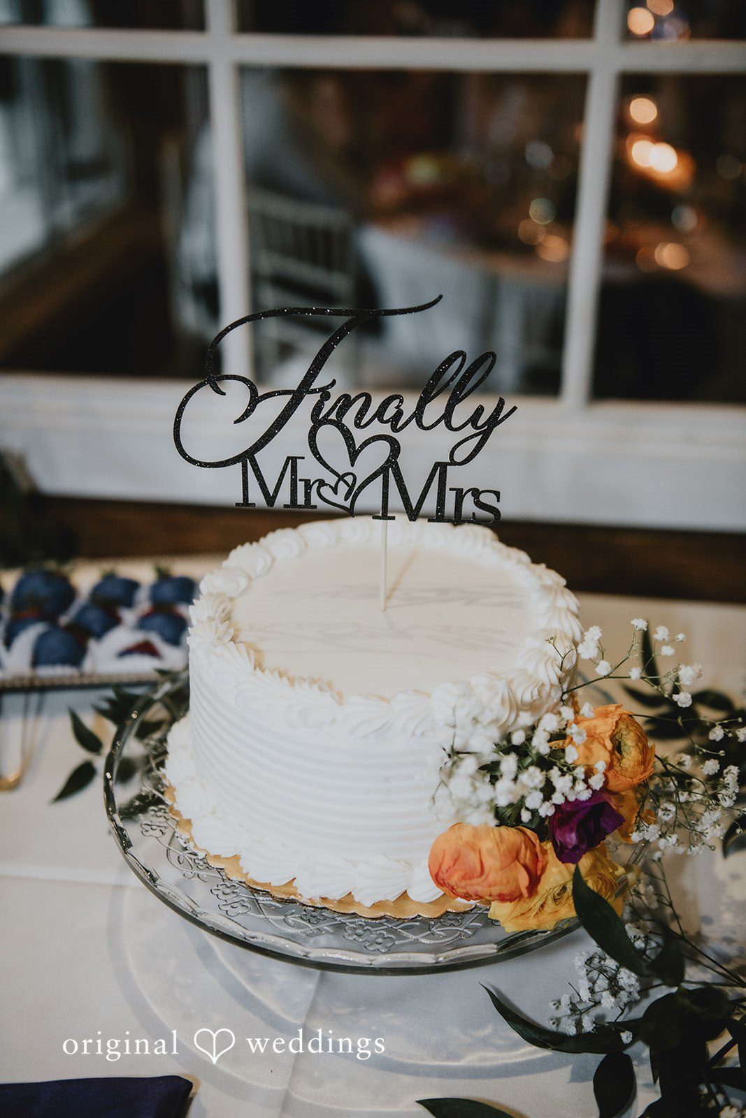 Julia + Kaleb Elegant wedding cake display at the reception