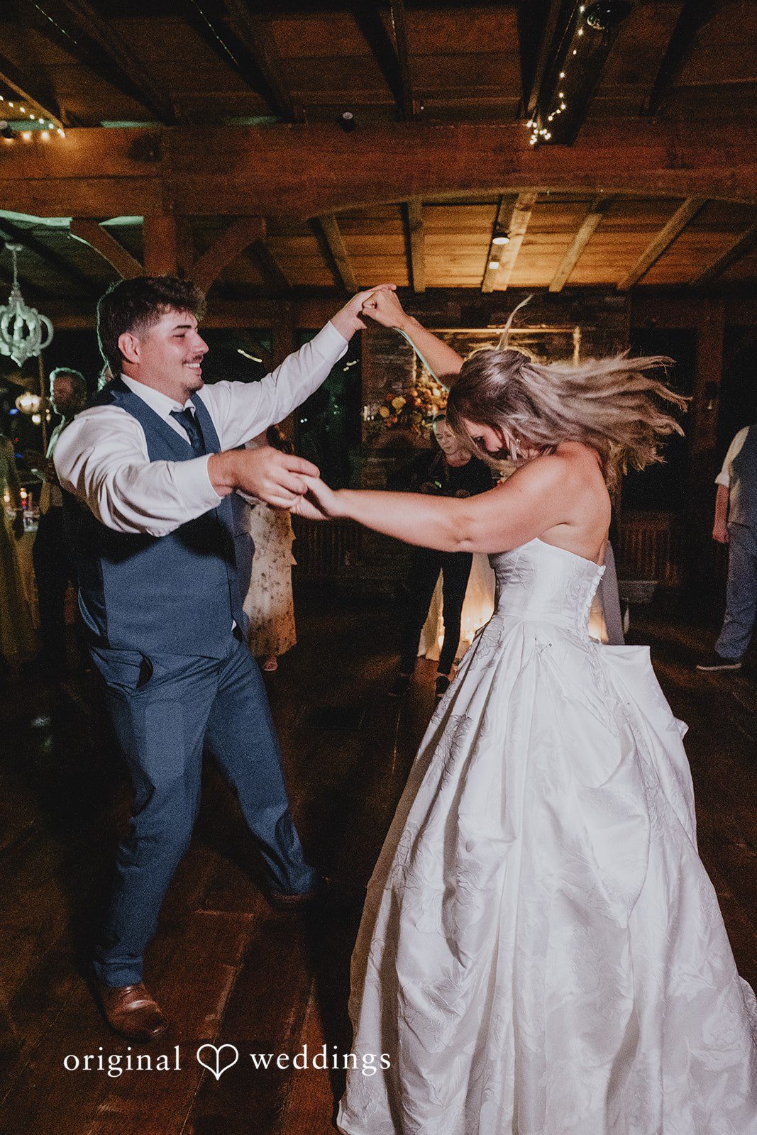 Julia + Kaleb Bride and groom enjoying fun moments at the reception