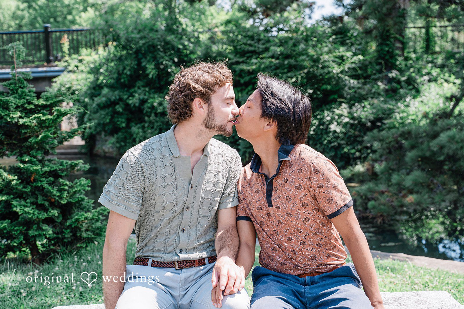 Couple sharing romantic kiss at Roger Williams Park