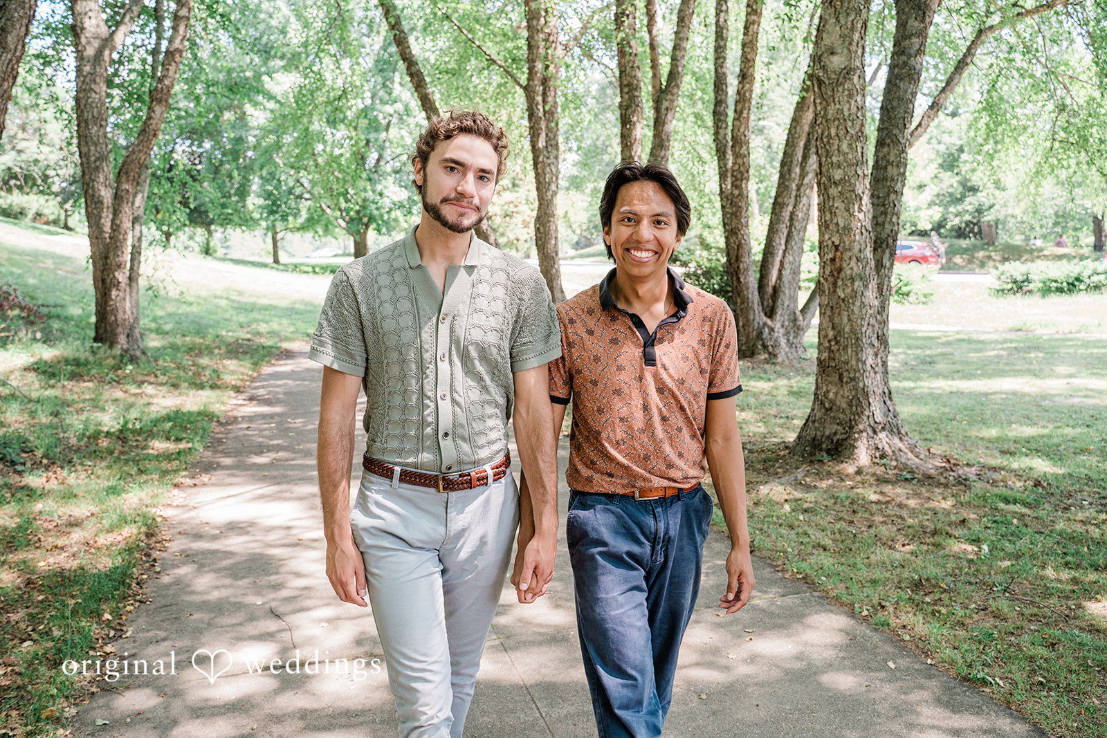 Couple holding hands while walking  at Roger Williams Park