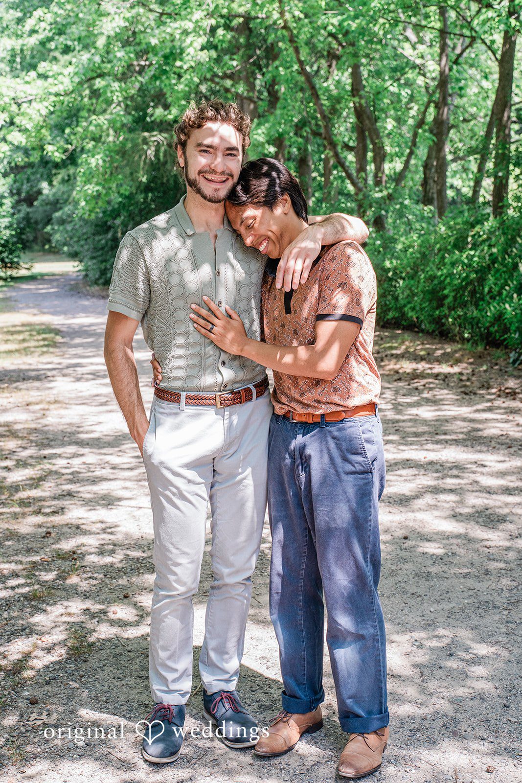Couple sharing romantic hug at Roger Williams Park
