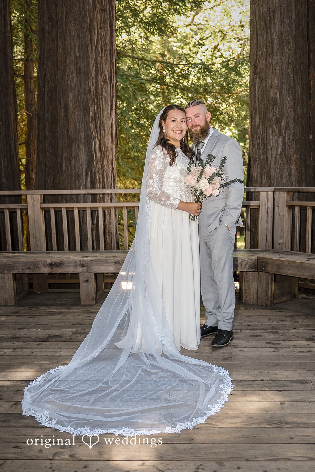 Brittany + Shane Couple smiling while looking at the camera at Sanborn County Park