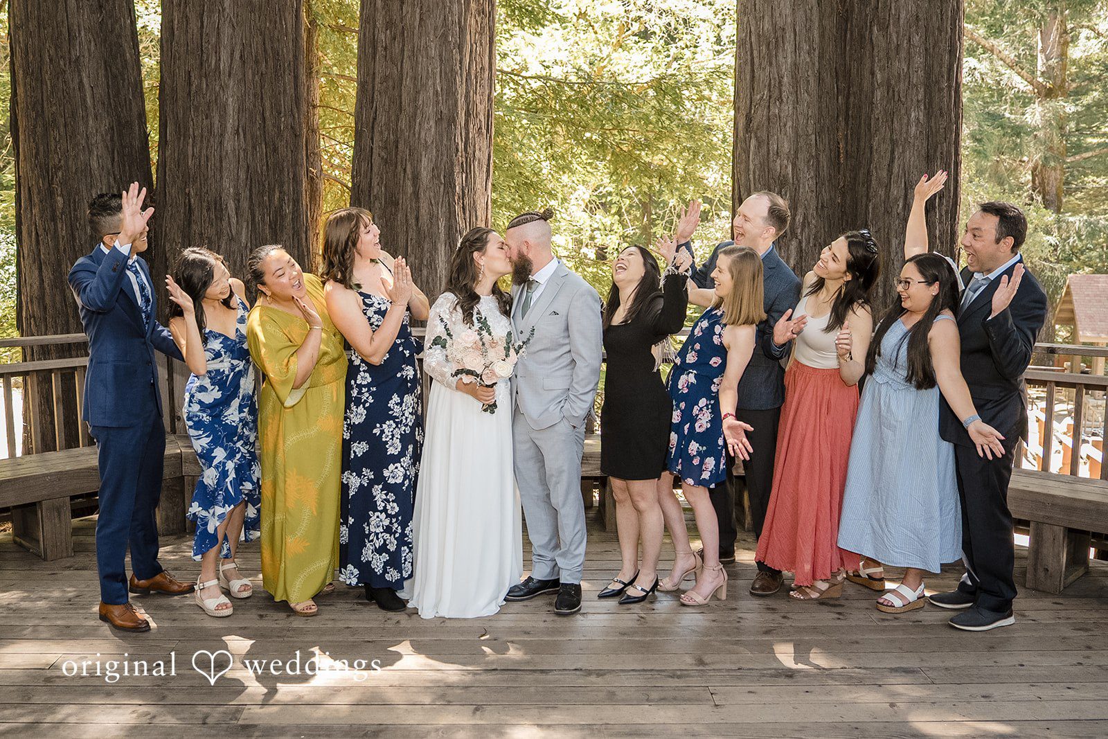 Brittany + Shane Couple smiling with friends in a group photo at Sanborn County Park