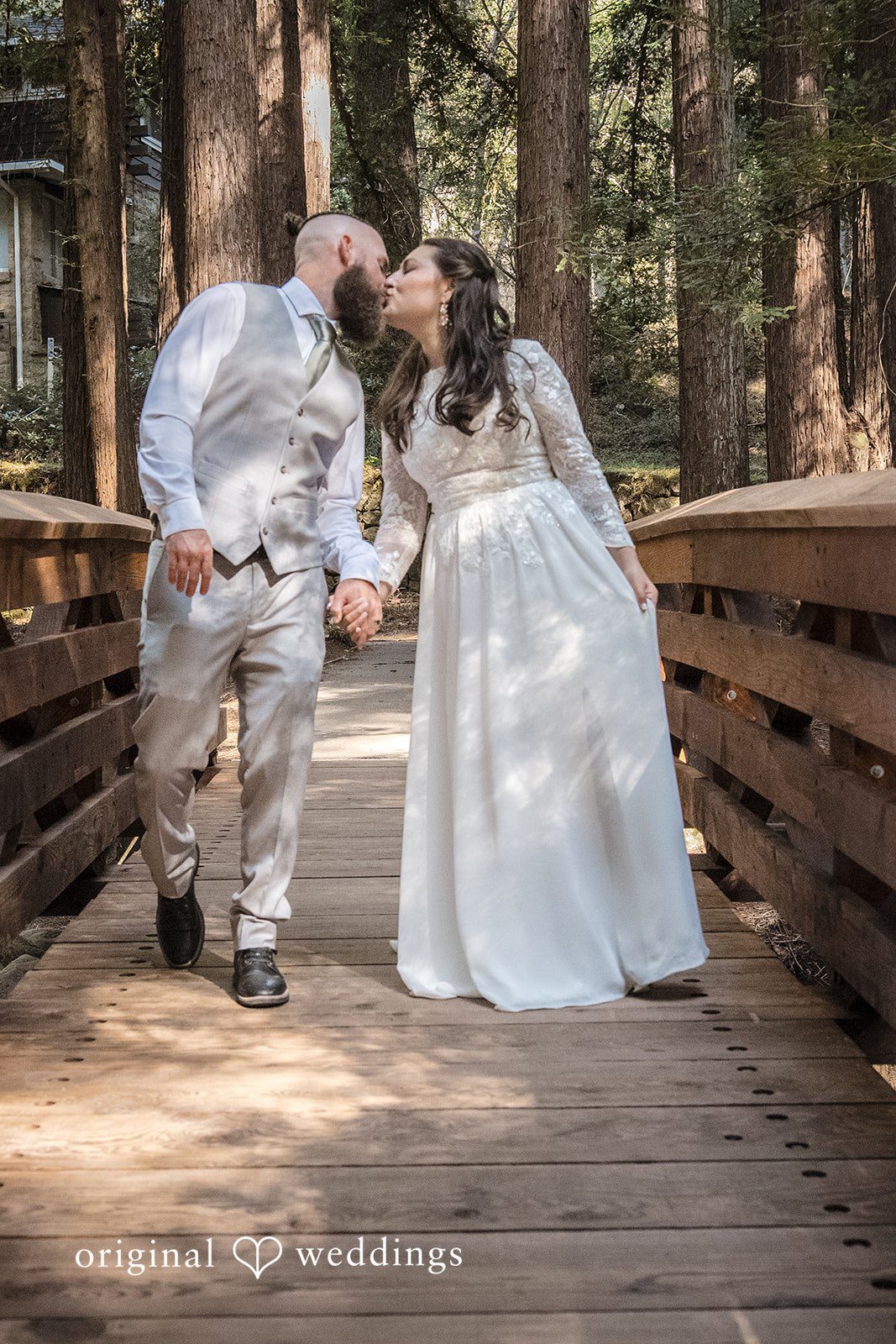 Brittany + Shane Bride and groom kissing during their portrait session at Sanborn County Park