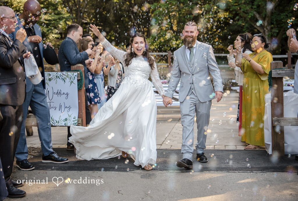 Sanborn County Park Wedding | Brittany & Shane 5 San Francisco Wedding Photographers capturing couple walking outside after the wedding at Sanborn County Park by Original Weddings