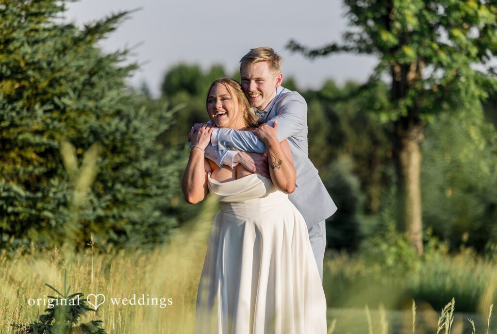 Emily + Ridge Golden hour portrait at Spruce Hill captured by Minneapolis Wedding Photographers from Original Weddings.