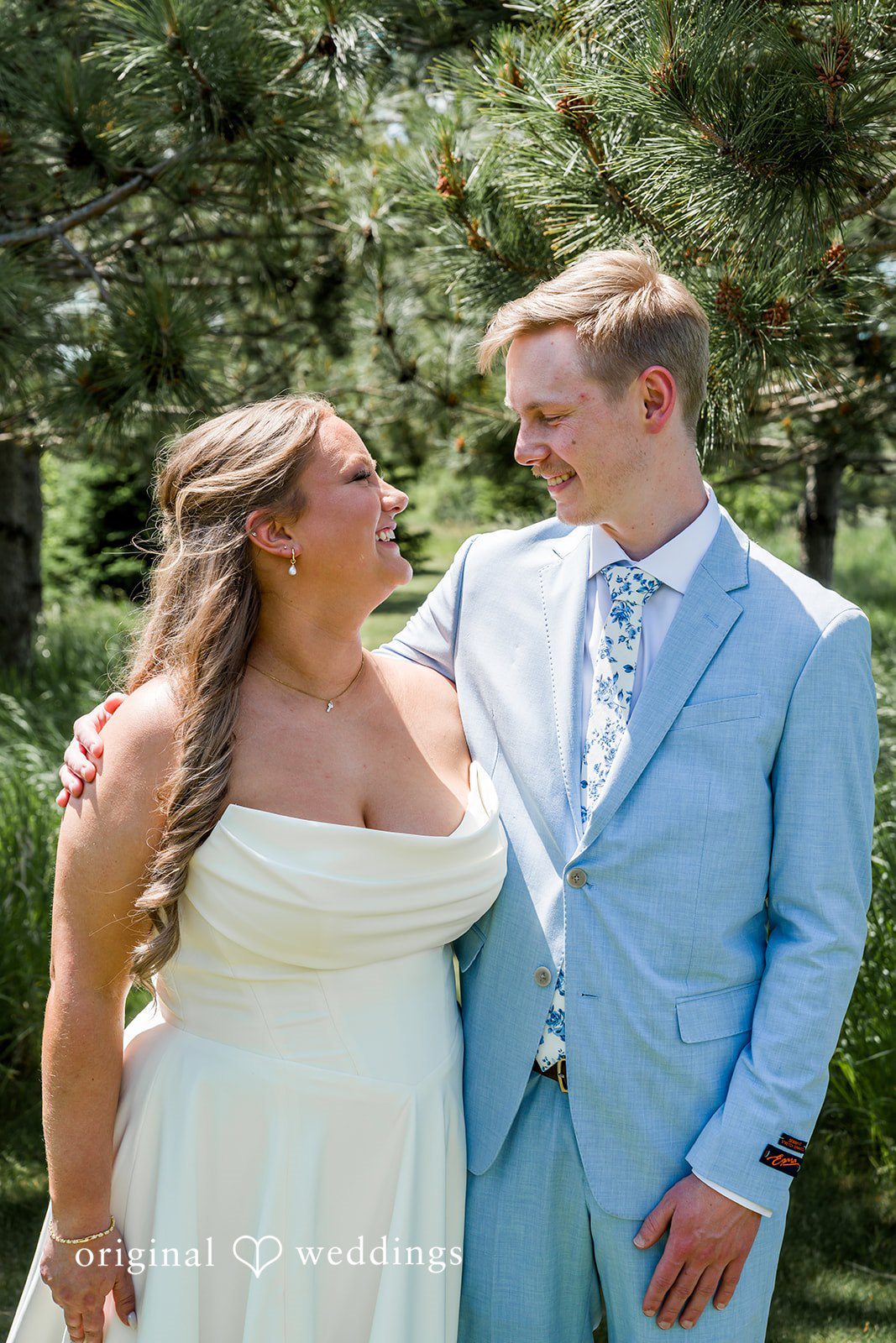 Emily + Ridge Romantic wedding portrait beside at Spruce Hill