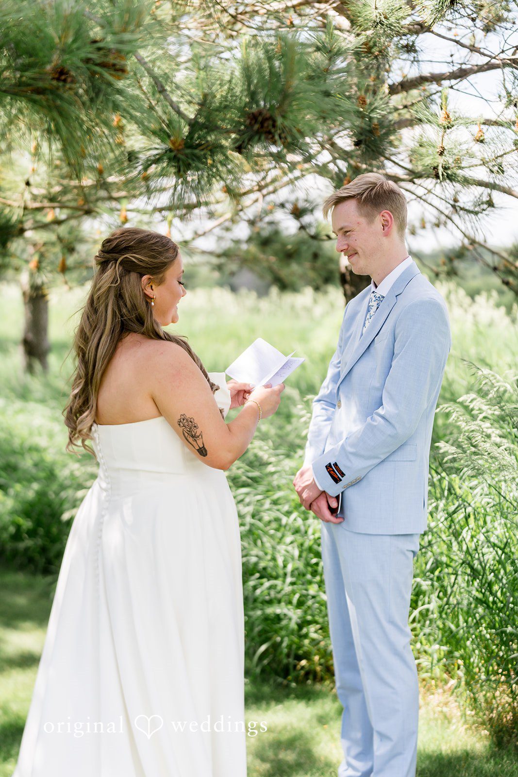 Emily + Ridge Bride reading a heartfelt note