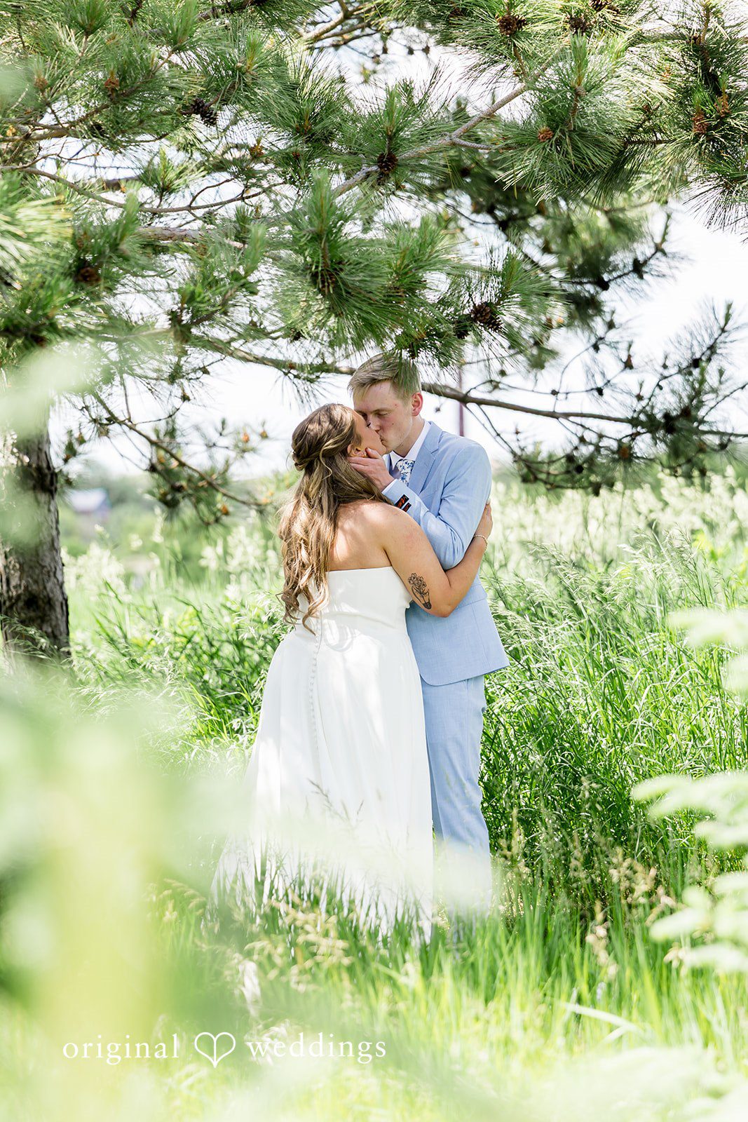 Emily + Ridge Romantic newlywed kiss at Spruce Hill