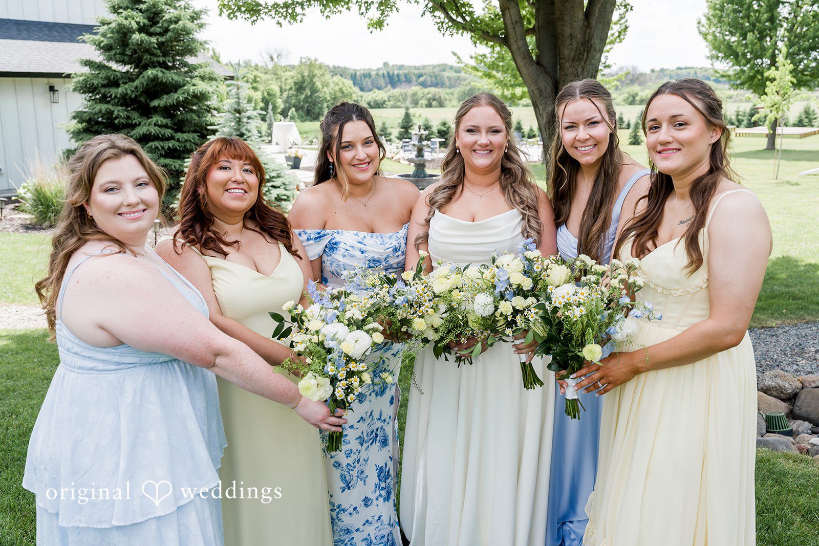 Emily + Ridge Bride with bridesmaids at Spruce Hill