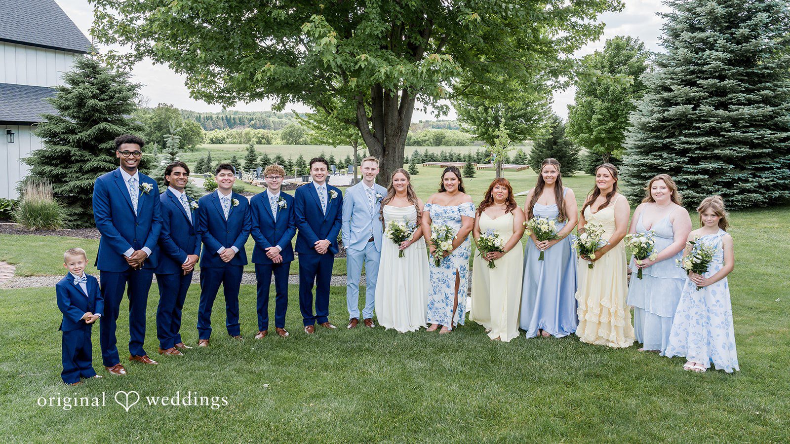 Emily + Ridge Wedding group picture at Spruce Hill captured by Minneapolis Wedding Photographers from Original Weddings.