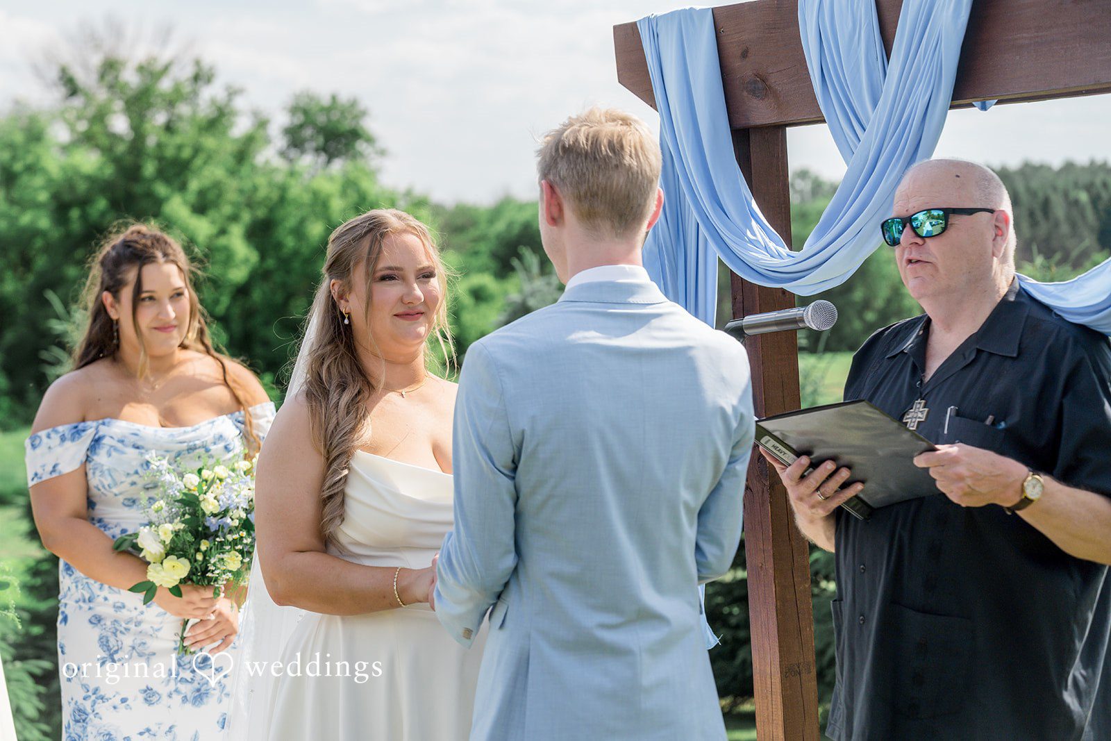 Emily + Ridge Bride smiling during ceremony