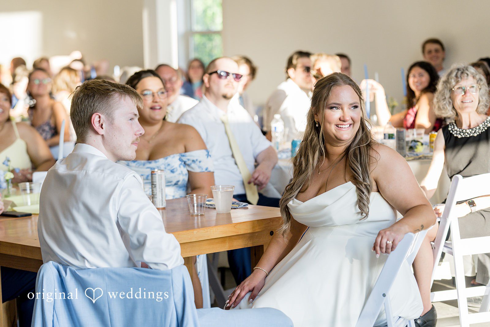 Emily + Ridge Newlyweds smiling together during their wedding reception at Spruce Hill