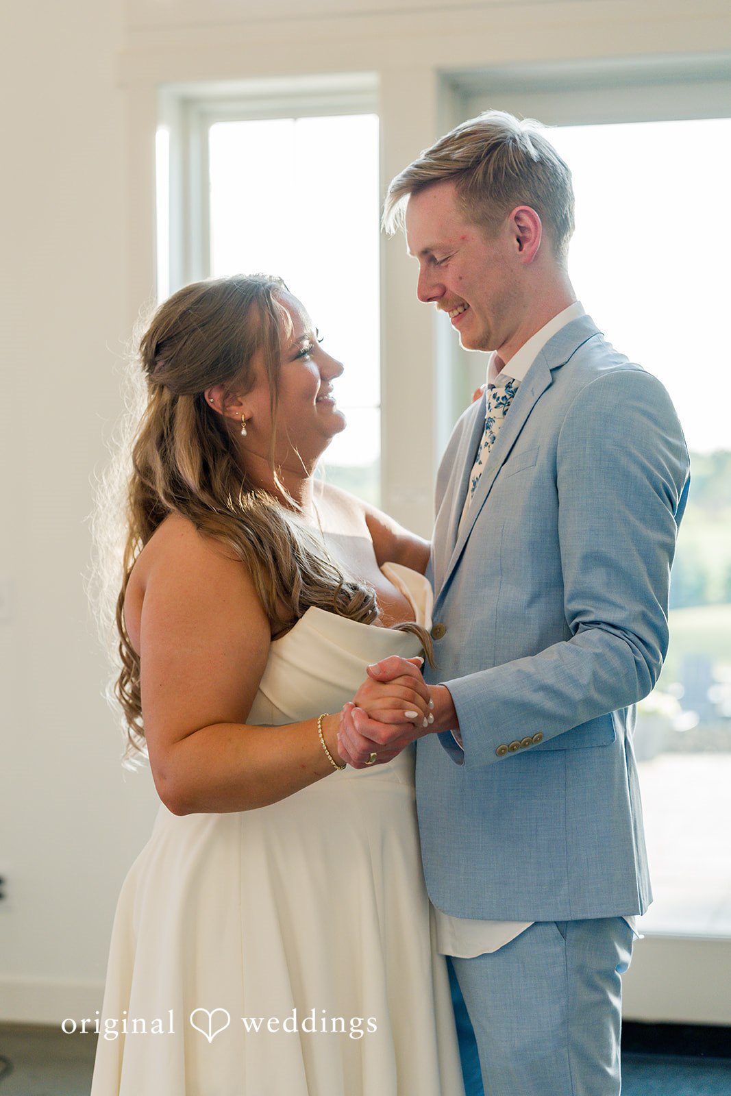 Emily + Ridge Bride and groom sharing their first dance at Spruce Hill