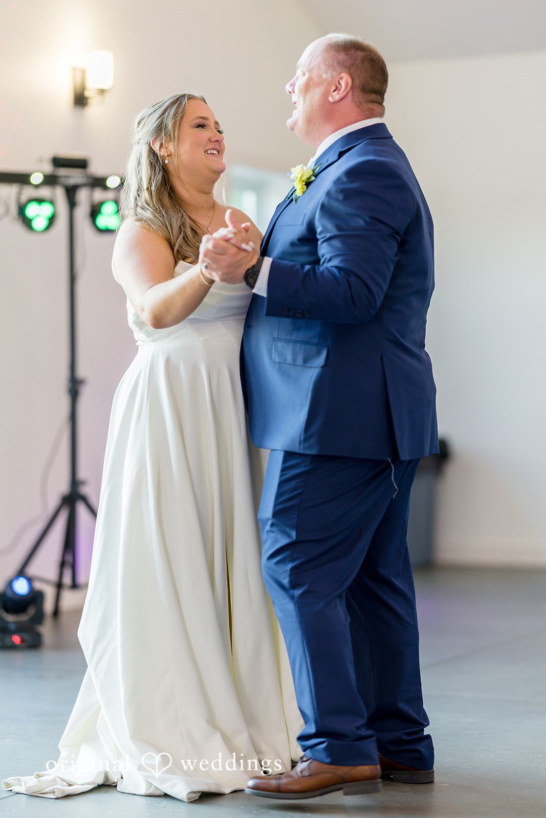 Emily + Ridge Bride sharing an emotional dance at Spruce Hill