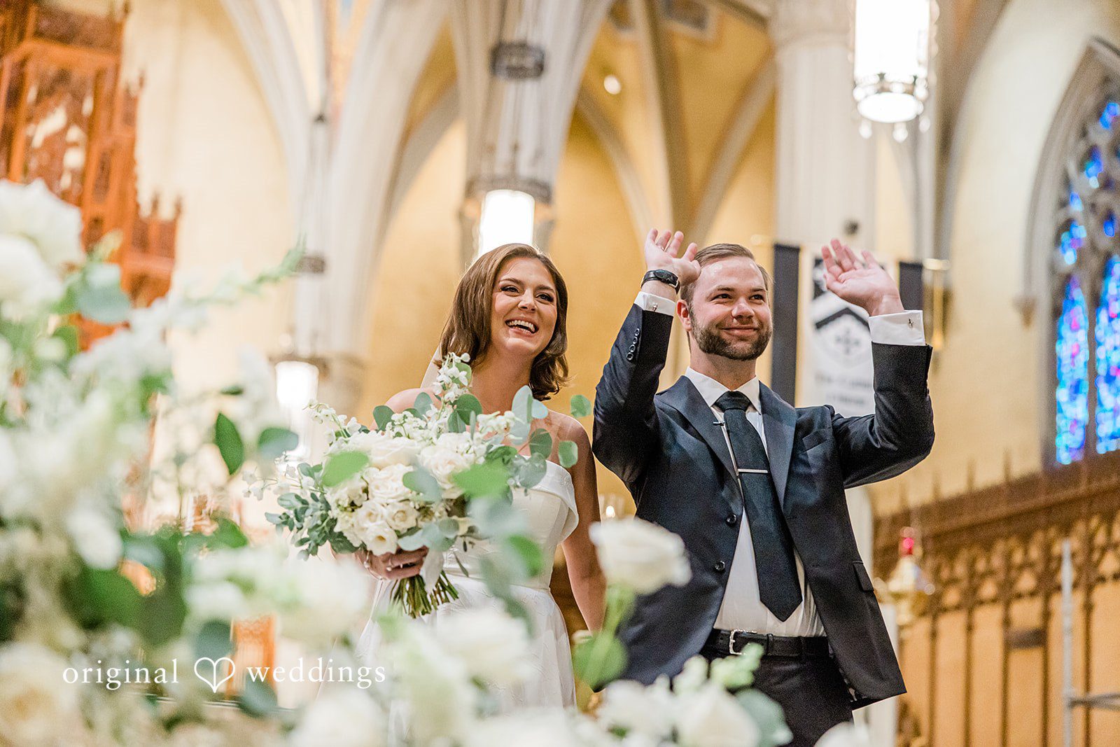 Luke + Madison Happy newlyweds celebrating at St. Clair Ballroom after the ceremony.