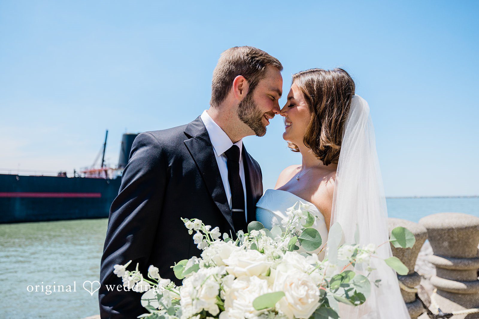 Luke + Madison Romantic forehead-to-forehead picture at St. Clair Ballroom captured by Cleveland Wedding Photographers from Original Weddings.