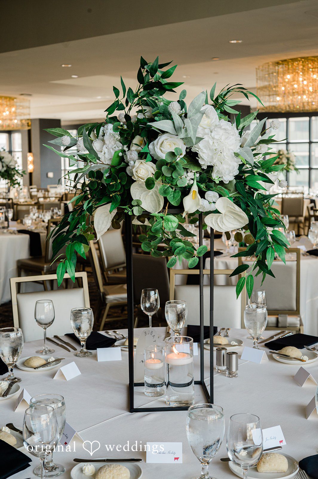 Luke + Madison Wedding reception table details with fine décor at St. Clair Ballroom.