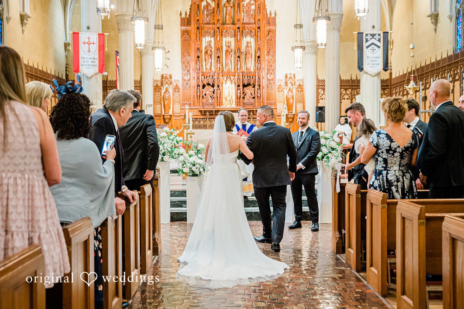 Luke + Madison Emotional bridal entrance inside St. Clair Ballroom.
