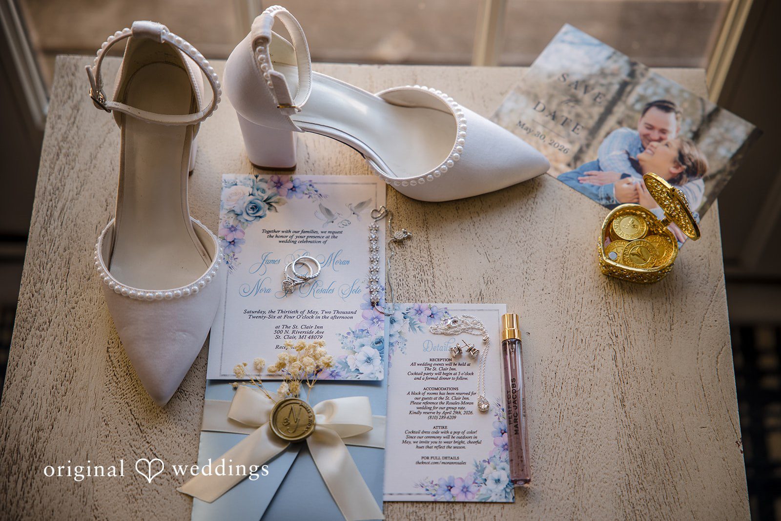 James + Nora Bride's wedding details with shoes invitation card and jewllery at St. Clair Inn