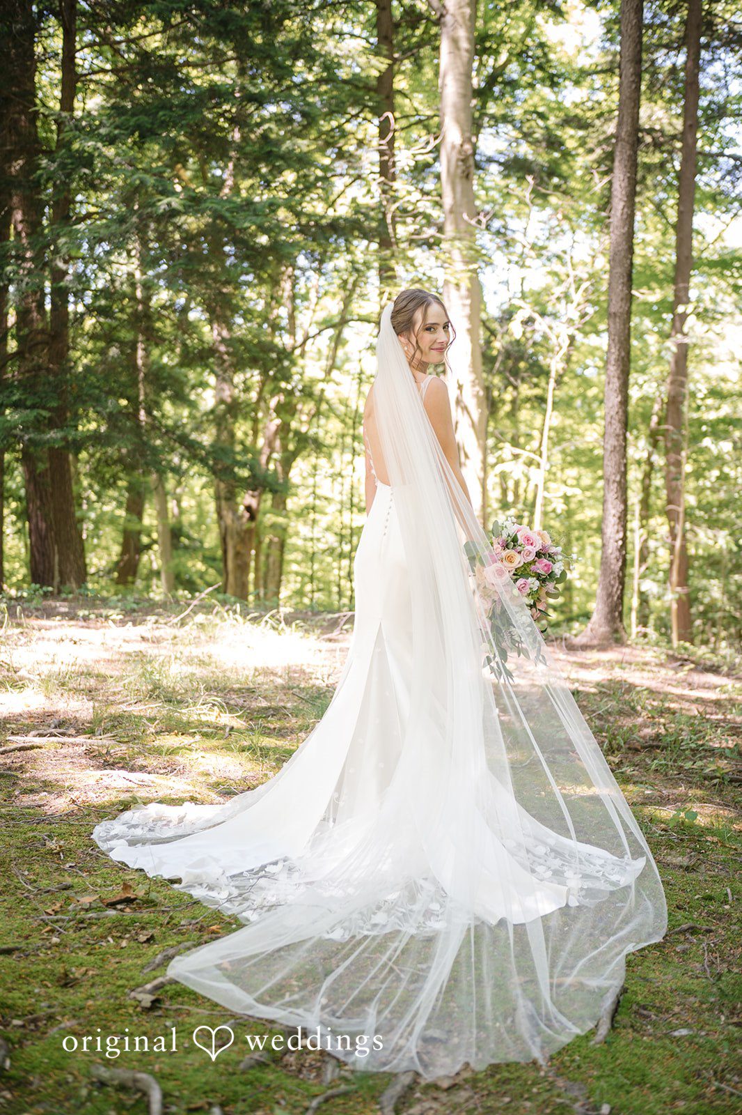 Laura + Robert Our Cleveland wedding photographers captured a stunning portrait of the bride