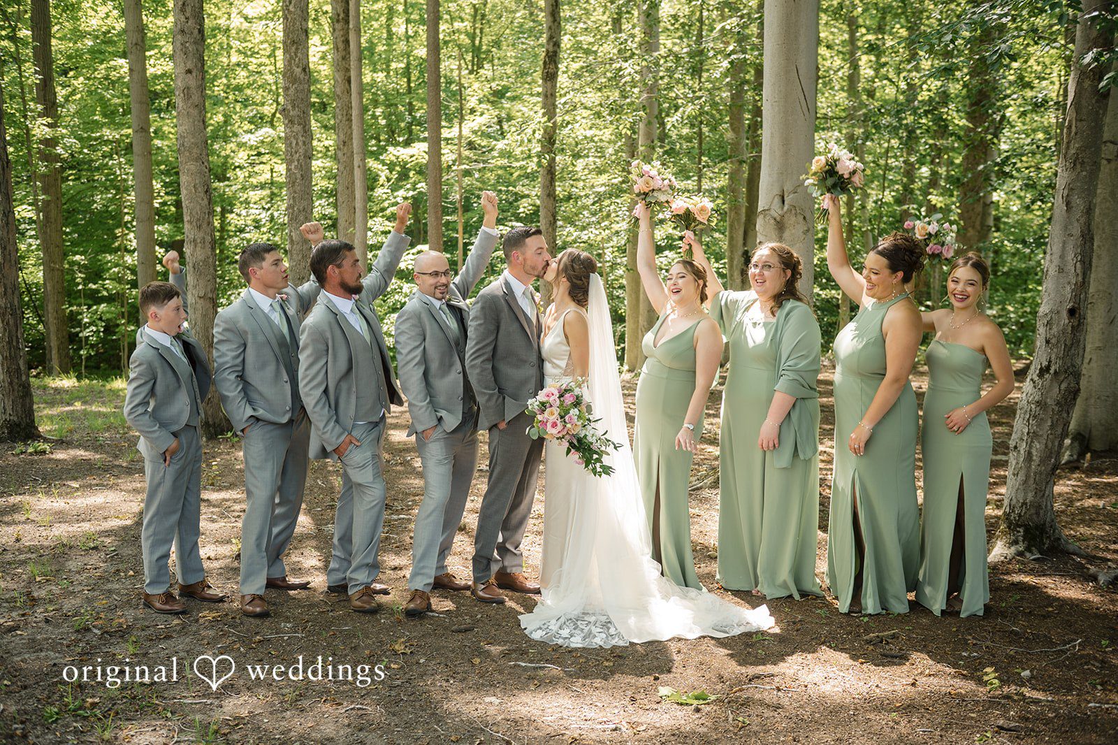 Laura + Robert The couple shares a romantic kiss