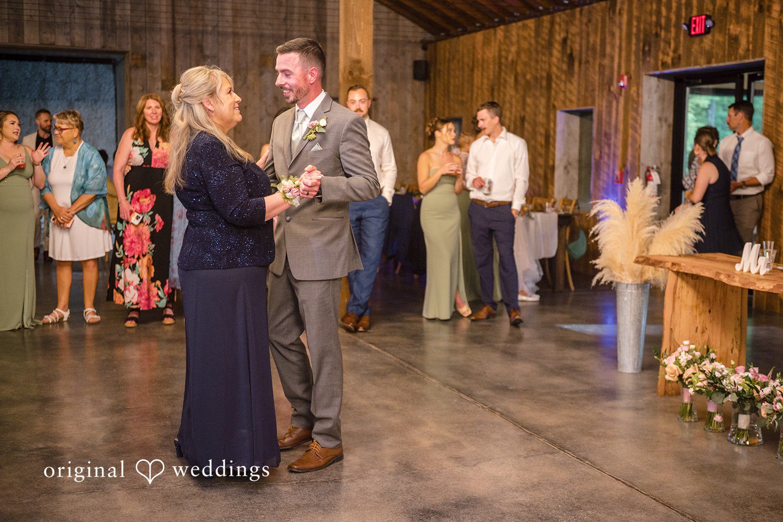 Laura + Robert The groom and his mother take beautiful dance moves