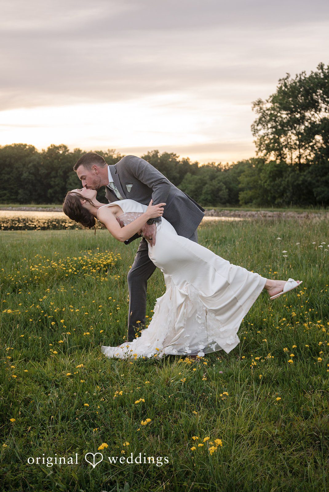 Laura + Robert The couple takes a romantic kiss