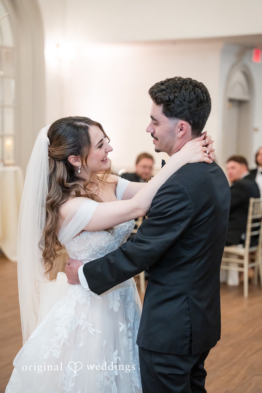 Romantic reception dance between the bride and groom at Sterling Hotel