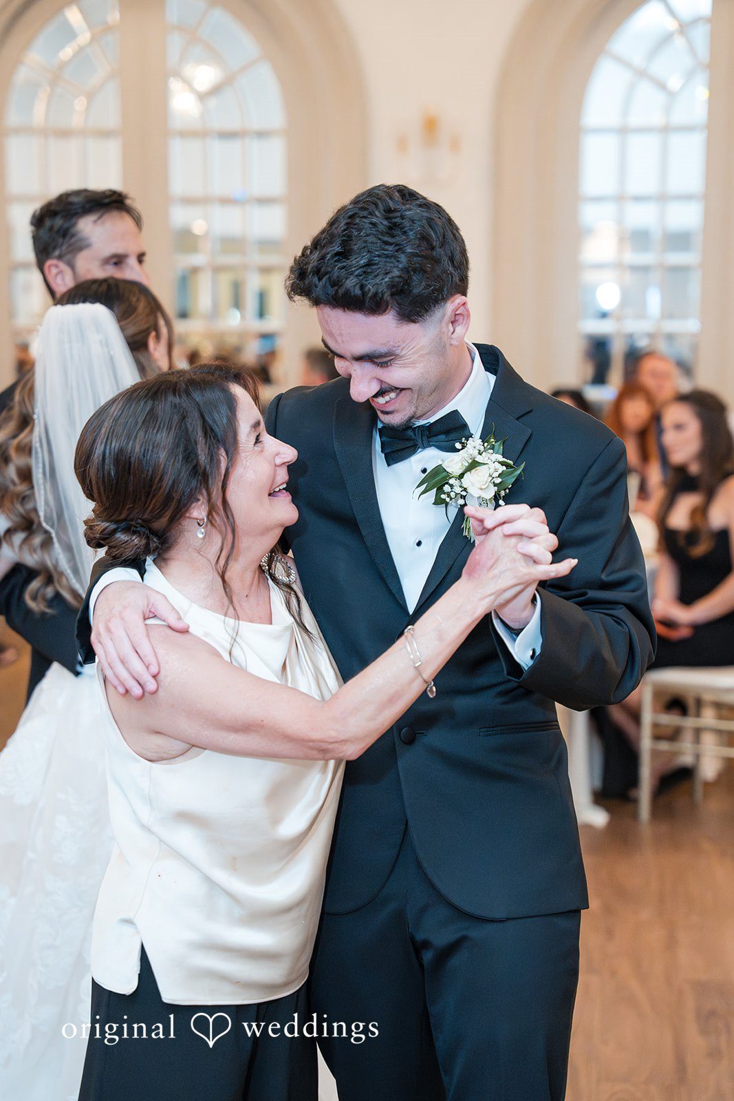 Heartfelt dance of groom during the wedding reception at Sterling Hotel