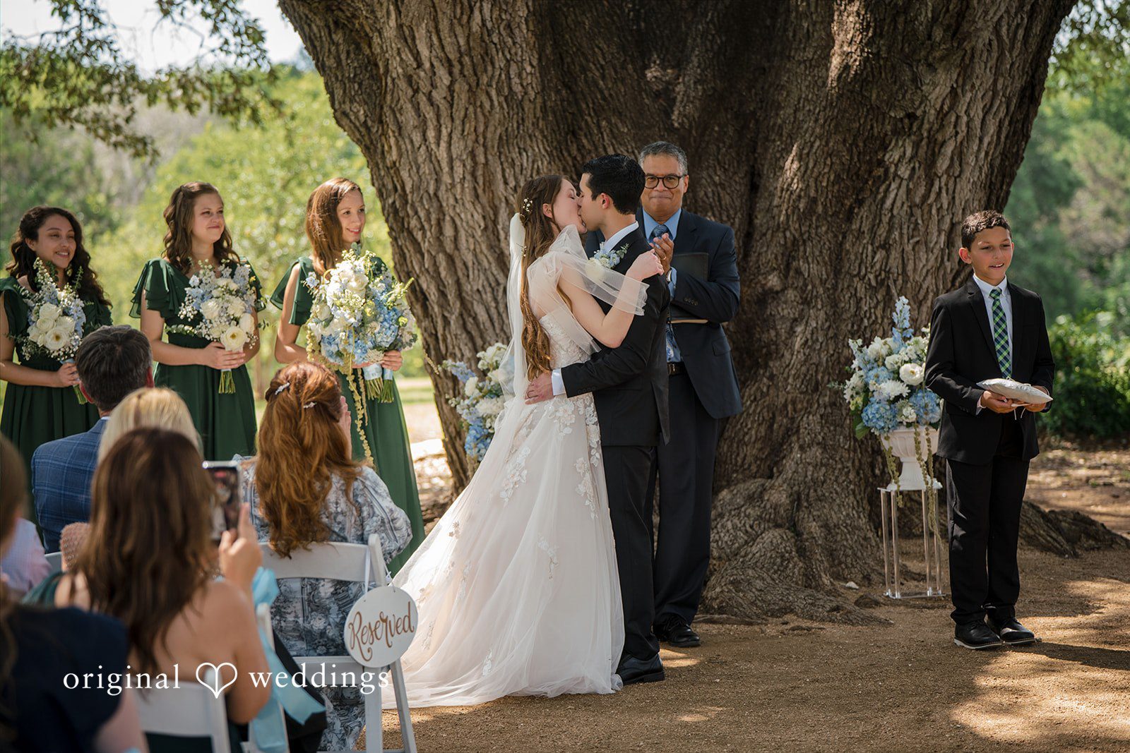 Morgan + Luke A bride and groom sharing a kiss at Stonebridge Wedding & Event Venue.