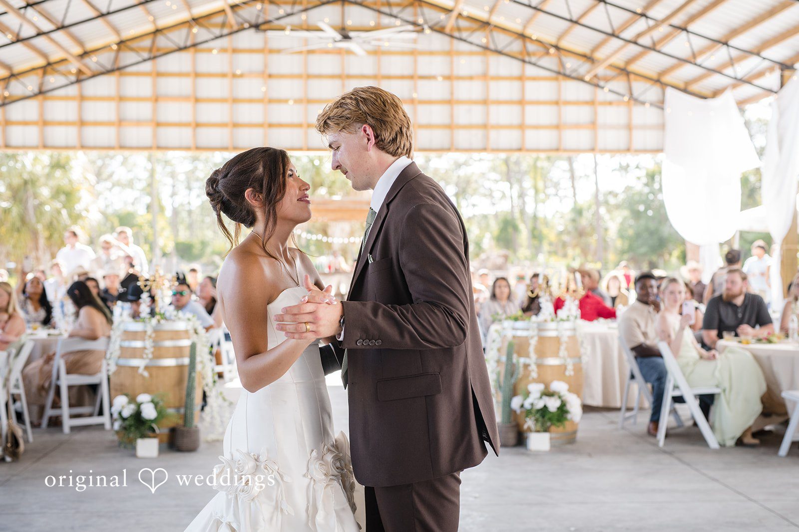 Couple looking at each other while dancing at San Pedro Catholic Church