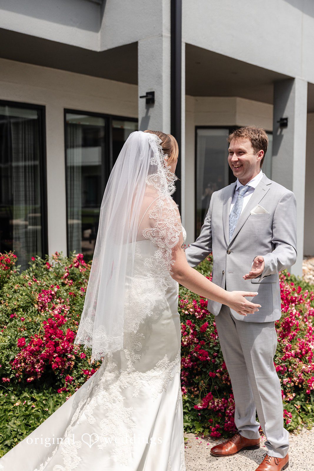 Bride and groom smiling at each other at Terrain Garden