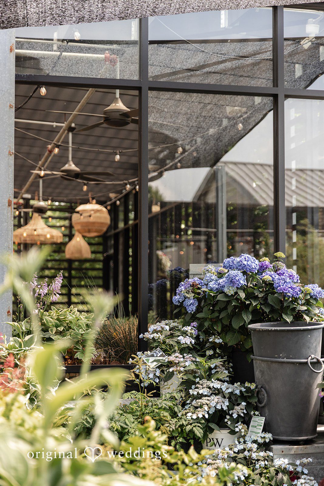 Outdoor view with flowers in vases at Terrain Garden