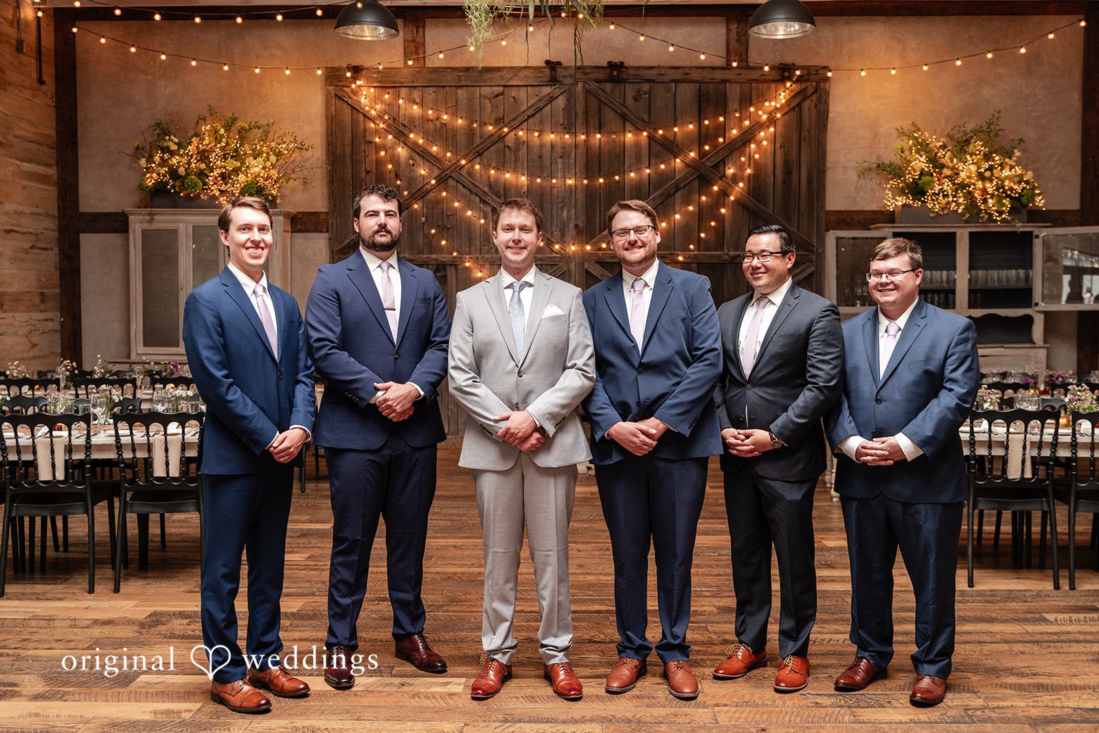 Groom smiling with the groomsmen before the ceremony at Terrain Garden