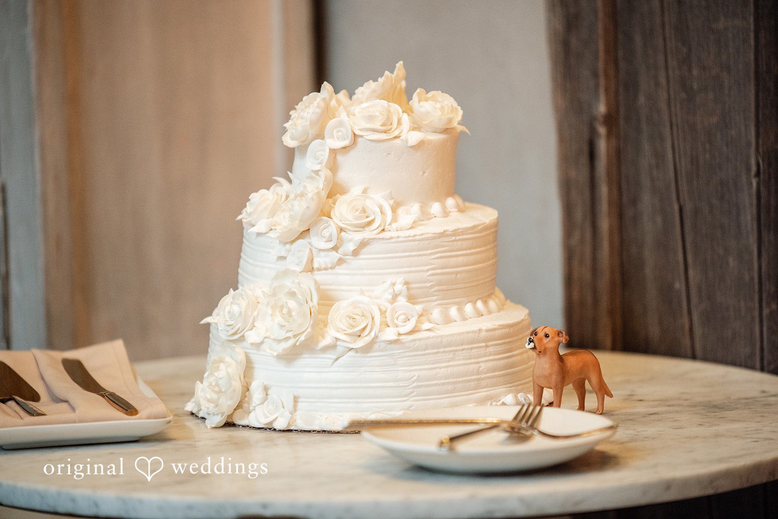 Close-up of the beautifully decorated wedding cake at Terrain Garden