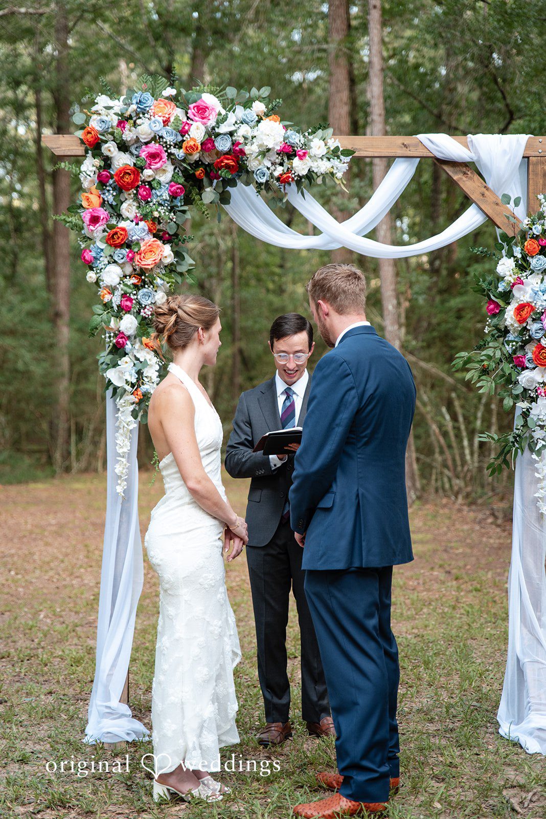 Morgan + Nick The priest blesses their union
