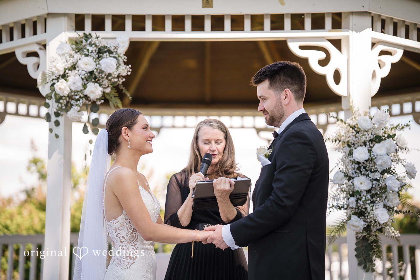 Hana and Sean’s The Abbey Resort wedding captured by Original Weddings Milwaukee Wedding Photographers with romantic portraits and waterfront celebration moments.