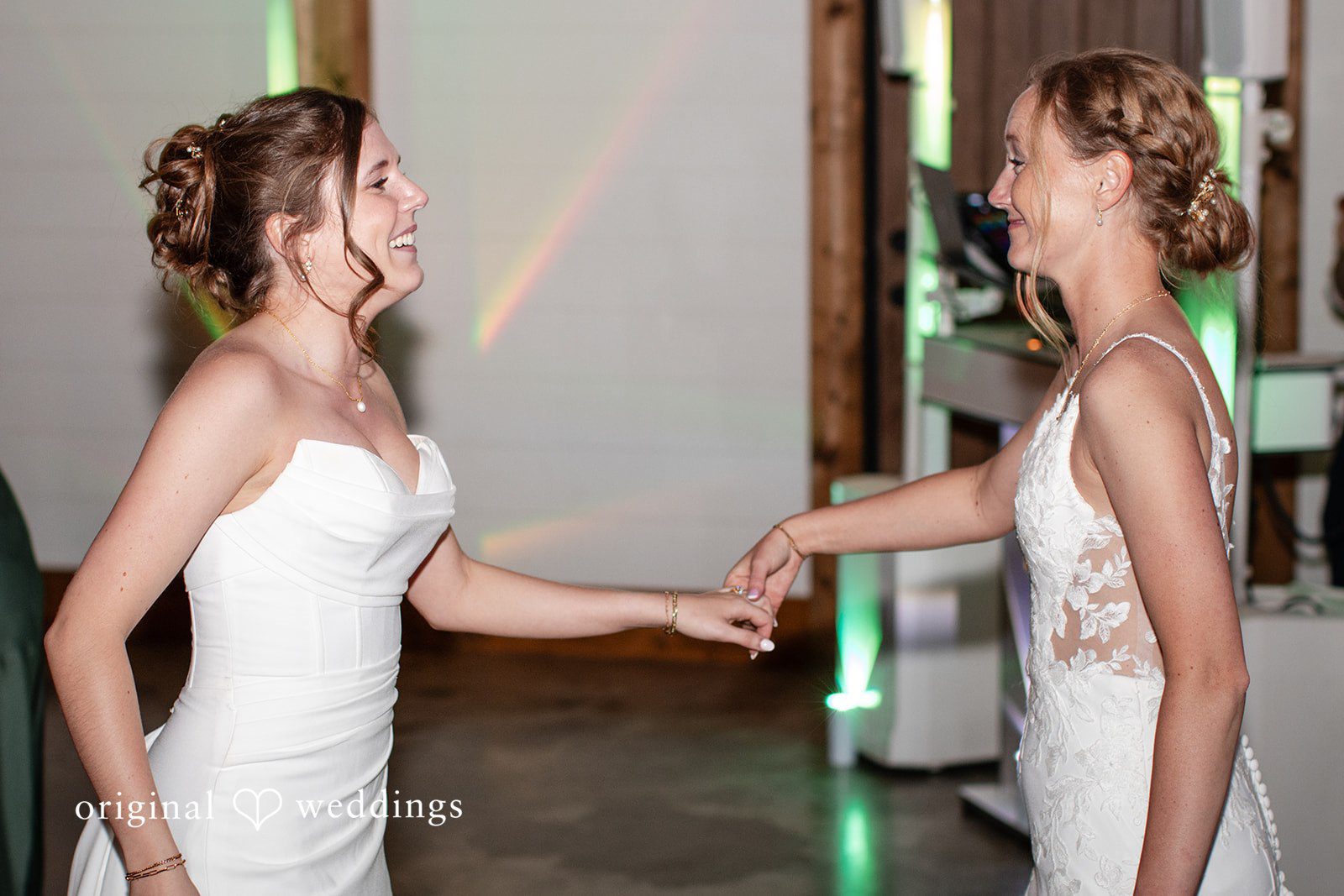 Madison + Ally Joyful first dance between newly married brides inside The Barn at Matson Hill.