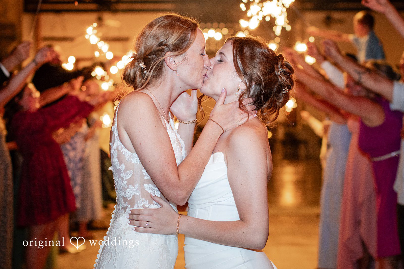 Madison + Ally Newly married brides kiss during their sparkler exit at The Barn at Matson Hill.