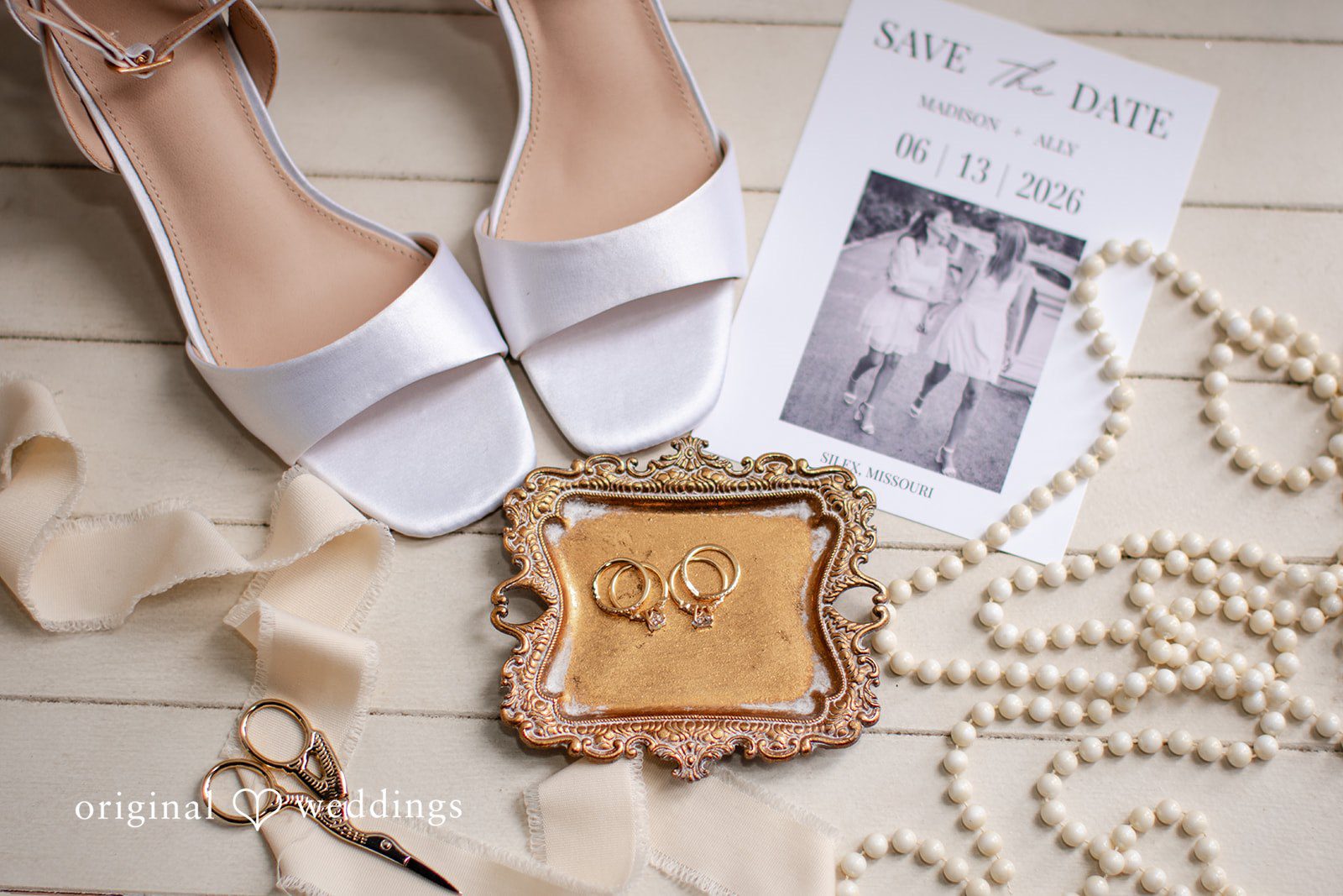 Madison + Ally Wedding invitation rings bridal shoes and pearl necklace styled for a beautiful flat lay at The Barn at Matson Hill.