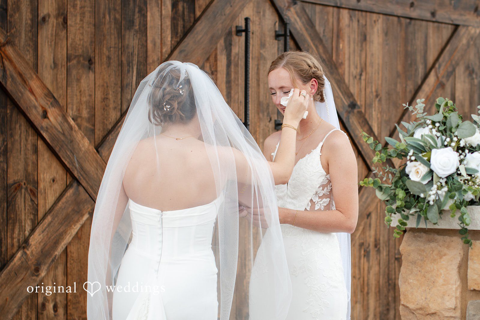 Madison + Ally Bride wiping tears during bride reading handwritten note for her