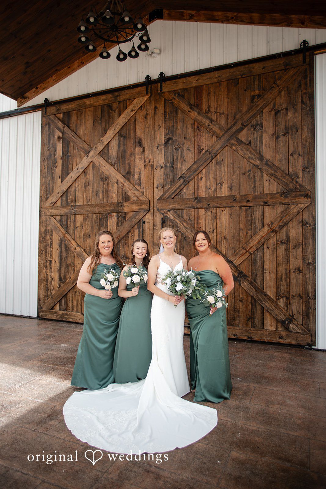 Madison + Ally Bride smiling alongside bridesmaids
