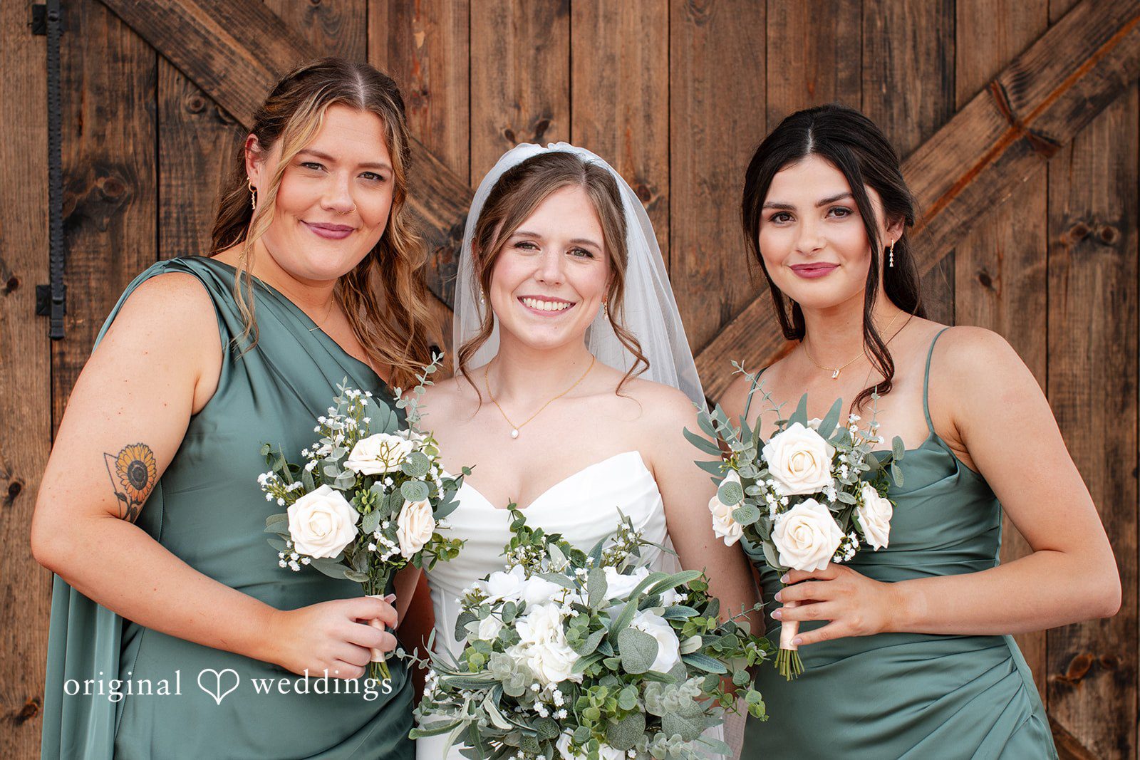 Madison + Ally Bride smiling with bridesmaids at The Barn at Matson Hill