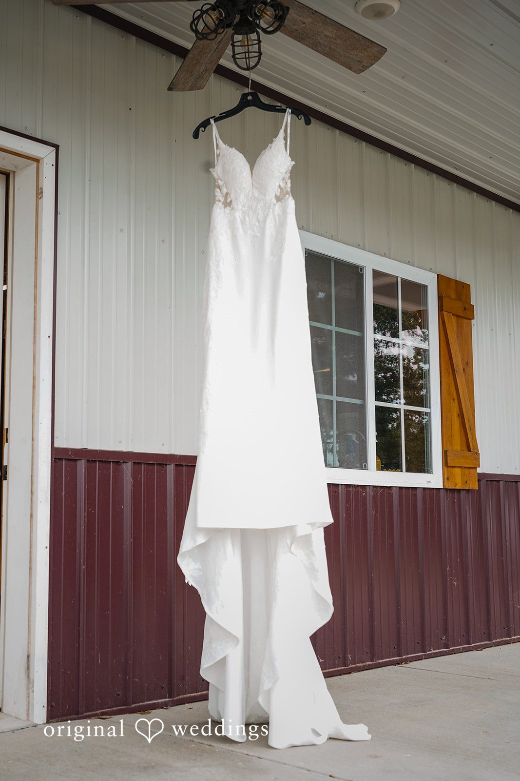 Madison + Ally Bride's wedding dress hanging at The Barn at Matson Hill