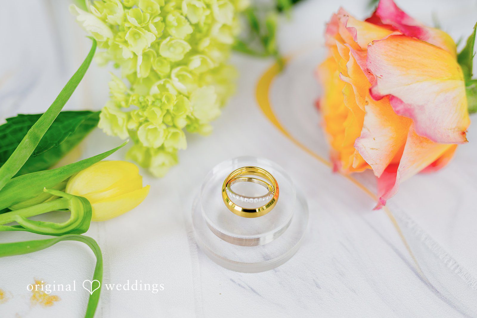 Maret + David Wedding rings and flowers